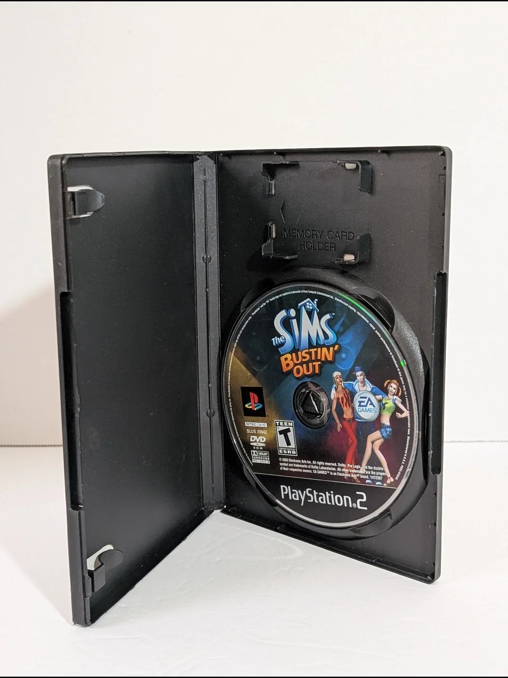 Sony PlayStation 2 The Sims Bustin' Out - Black, Blue, Yellow, Pink